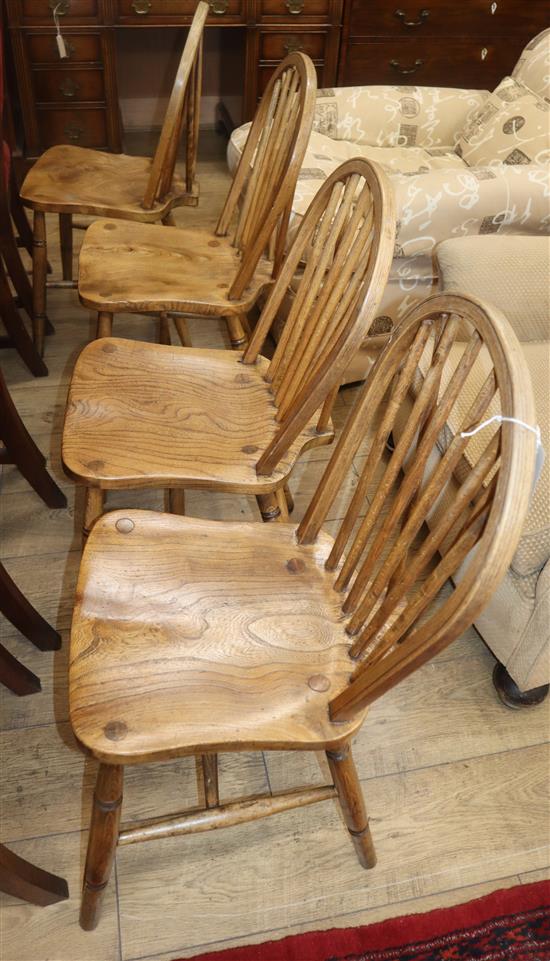 Four Victorian ash and elm Windsor comb back chairs